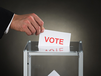 Vote placed in ballot box.