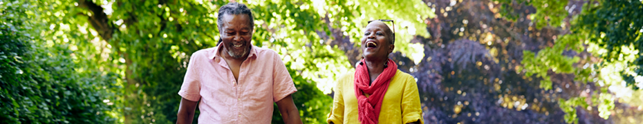 Couple walking in a park.